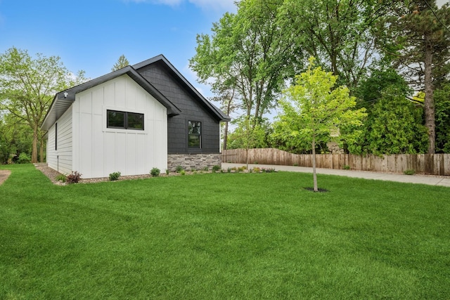3909 54th St, Edina, MN 55424 - view of side of property with board and batten siding and stone siding