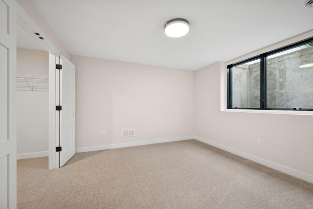 3909 54th St, Edina, MN 55424 - unfurnished bedroom with carpet, a spacious closet, and a closet