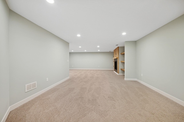 3909 54th St, Edina, MN 55424 - finished below grade area with light carpet and recessed lighting