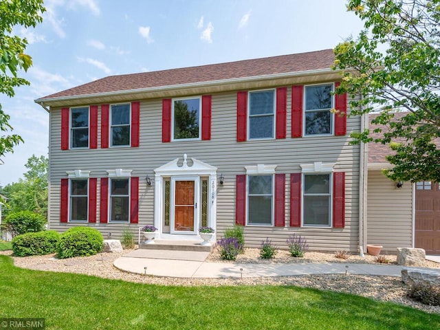 20108 Calgary Trl, Empire Twp, MN 55024 - colonial house with a front lawn