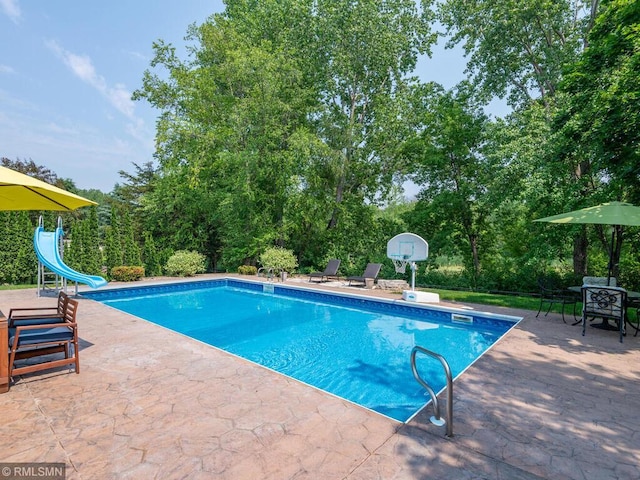20108 Calgary Trl, Empire Twp, MN 55024 - outdoor pool with a patio area and a water slide