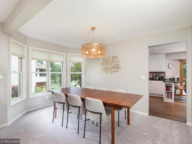 20108 Calgary Trl, Empire Twp, MN 55024 - carpeted dining area with healthy amount of natural light