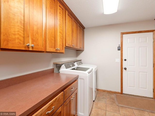 20108 Calgary Trl, Empire Twp, MN 55024 - laundry room with washer and dryer, cabinet space, and light tile patterned floors