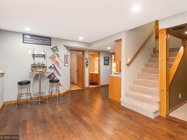 20108 Calgary Trl, Empire Twp, MN 55024 - bar with wood finished floors, stairs, and recessed lighting