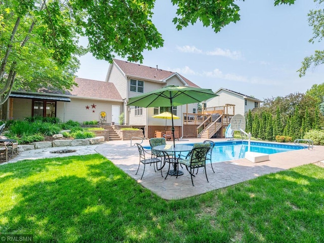 20108 Calgary Trl, Empire Twp, MN 55024 - outdoor pool featuring stairs, a deck, a patio area, and a yard