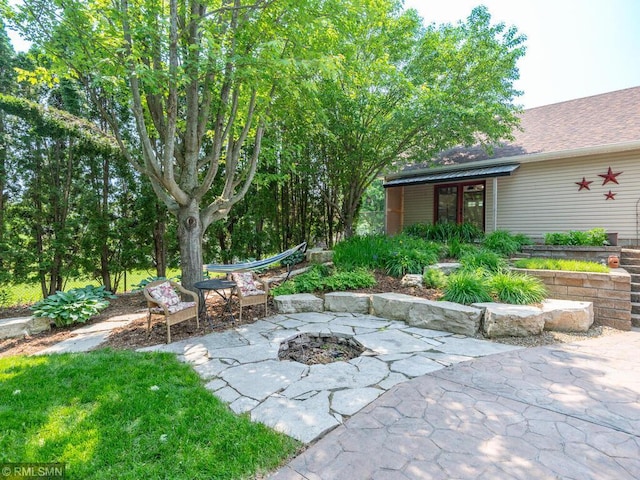 20108 Calgary Trl, Empire Twp, MN 55024 - view of patio / terrace featuring a fire pit