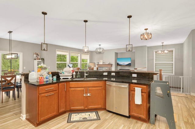 11950 75th St NE, Otsego, MN 55301 - kitchen with stainless steel dishwasher, light wood finished floors, a chandelier, and brown cabinets
