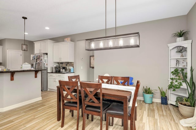 11950 75th St NE, Otsego, MN 55301 - dining room with light wood-style floors and recessed lighting