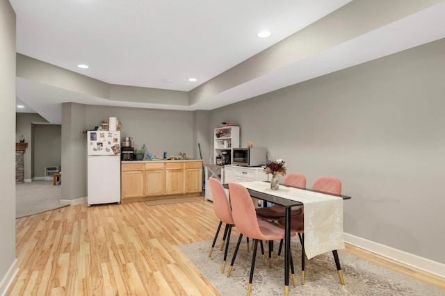 11950 75th St NE, Otsego, MN 55301 - dining room featuring light wood finished floors and recessed lighting