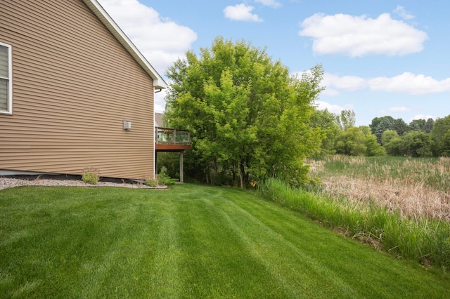 11950 75th St NE, Otsego, MN 55301 - view of green lawn with a wooden deck