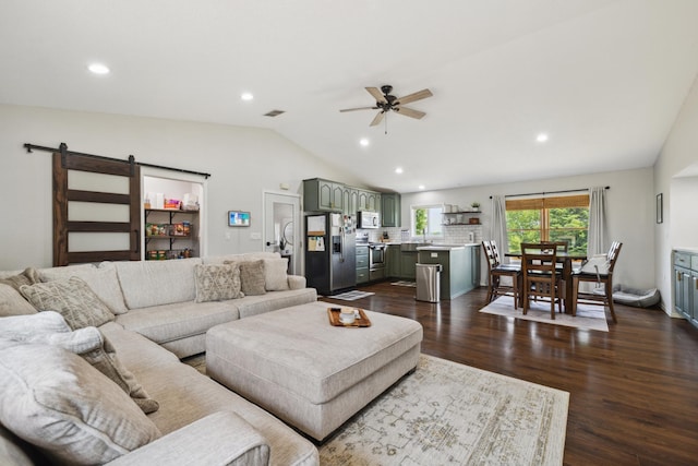 17561 Denkbar Loop, Park Rapids, MN 56470 - living room with a ceiling fan, vaulted ceiling, recessed lighting, dark wood-style floors, and a barn door