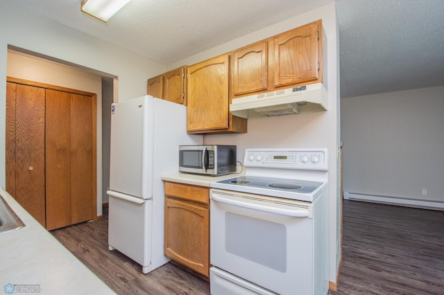 2417 Demores Dr S Unit 2, Fargo, ND 58103 - kitchen with white appliances, under cabinet range hood, dark wood-style floors, light countertops, and a textured ceiling