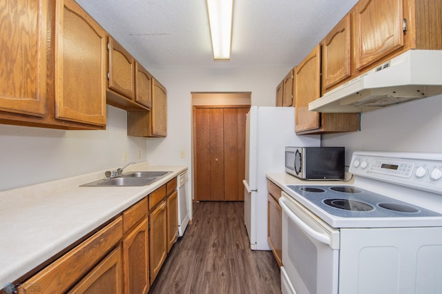 2417 Demores Dr S Unit 2, Fargo, ND 58103 - kitchen with white appliances, under cabinet range hood, dark wood-type flooring, and light countertops