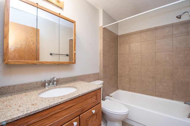2417 Demores Dr S Unit 2, Fargo, ND 58103 - bathroom with vanity, shower / bath combination, and a textured ceiling