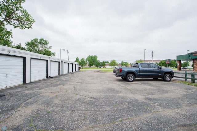 2417 Demores Dr S Unit 2, Fargo, ND 58103 - view of parking / parking lot featuring community garages