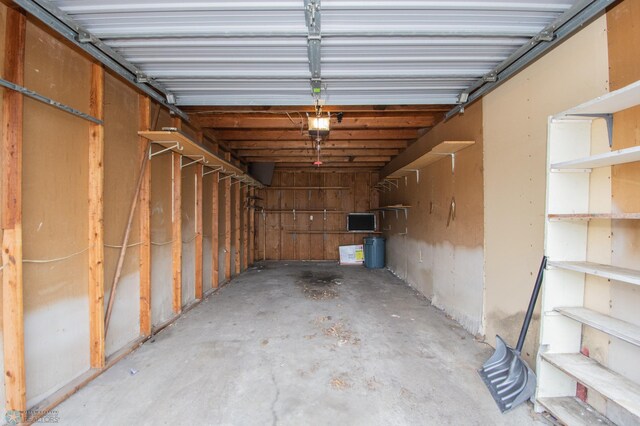 2417 Demores Dr S Unit 2, Fargo, ND 58103 - garage with a garage door opener