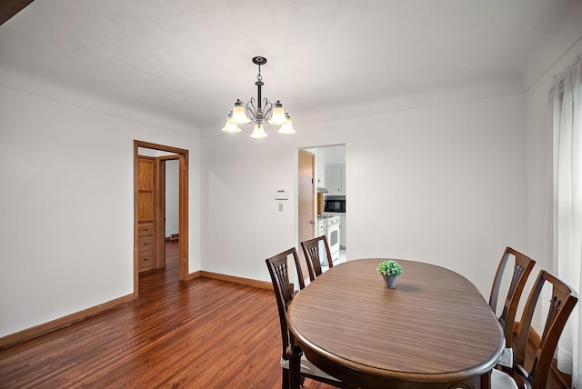 1442 Como Ave, Saint Paul, MN 55108 - dining area with a chandelier and dark wood-style flooring