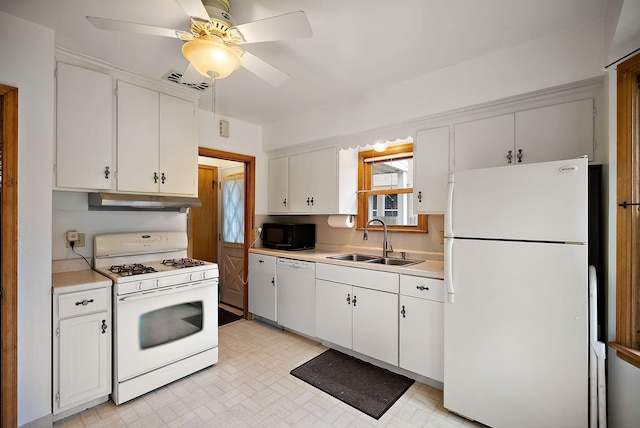 1442 Como Ave, Saint Paul, MN 55108 - kitchen with white appliances, under cabinet range hood, light countertops, a ceiling fan, and white cabinets