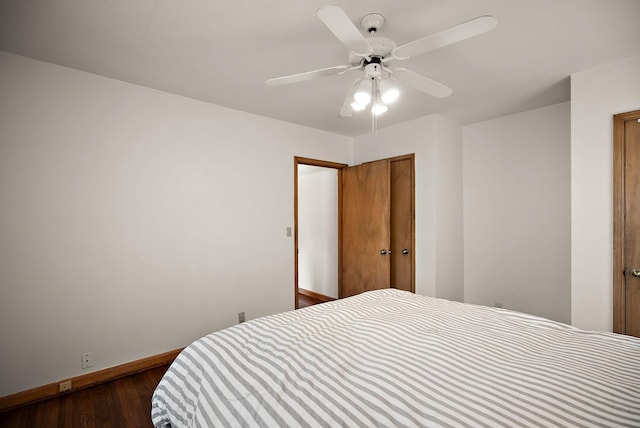 1442 Como Ave, Saint Paul, MN 55108 - bedroom with dark wood finished floors, ceiling fan, and a closet