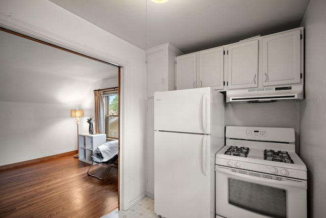 1442 Como Ave, Saint Paul, MN 55108 - kitchen featuring under cabinet range hood, white appliances, white cabinets, light floors, and lofted ceiling