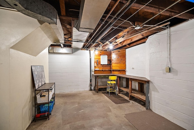 1442 Como Ave, Saint Paul, MN 55108 - unfinished below grade area featuring a workshop area and concrete block wall