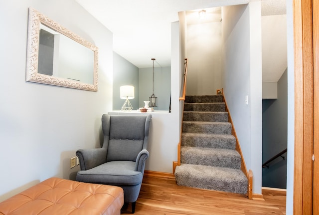 5724 4th St NE, Fridley, MN 55432 - stairs featuring wood finished floors