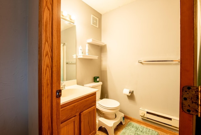 5724 4th St NE, Fridley, MN 55432 - full bathroom with baseboard heating, vanity, and wood finished floors
