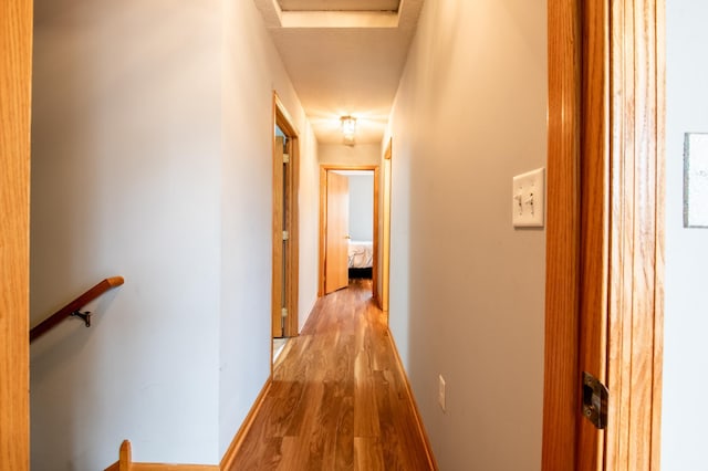 5724 4th St NE, Fridley, MN 55432 - hallway featuring an upstairs landing and light wood finished floors