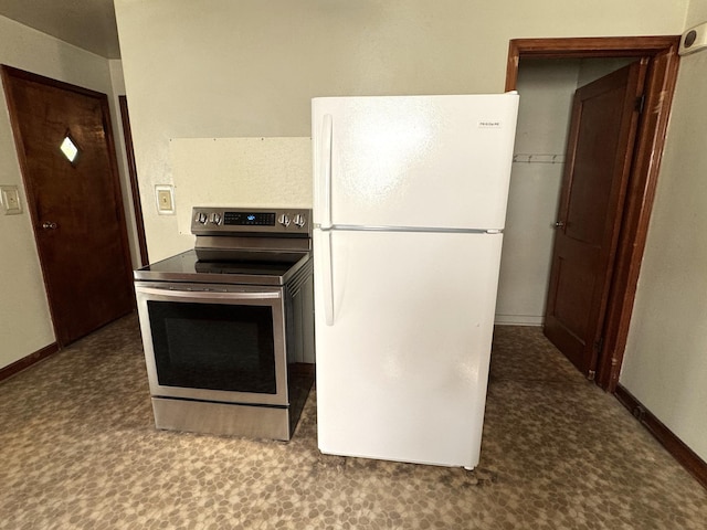 302 30th Ave N, Saint Cloud, MN 56303 - kitchen featuring freestanding refrigerator, stainless steel electric range, and tile patterned floors