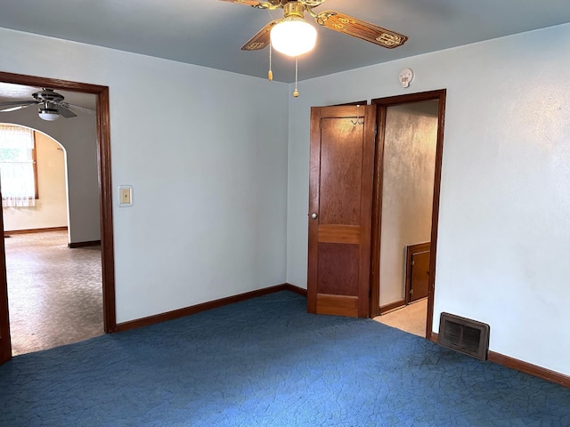 302 30th Ave N, Saint Cloud, MN 56303 - carpeted spare room featuring ceiling fan and arched walkways