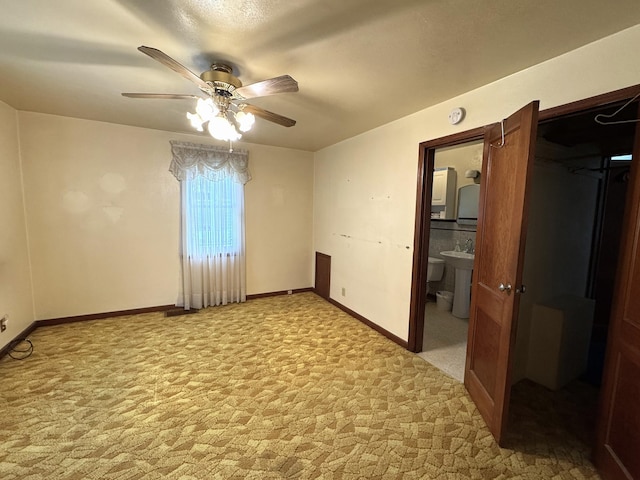 302 30th Ave N, Saint Cloud, MN 56303 - empty room featuring ceiling fan and light colored carpet