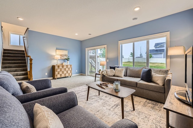 15141 Partridge St NW, Andover, MN 55304 - living room featuring stairway, carpet floors, and recessed lighting