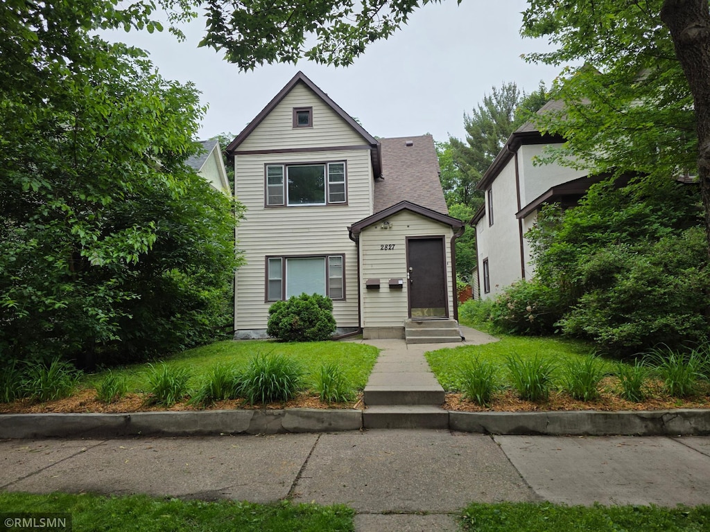 2827 Polk St NE, Minneapolis, MN 55418 - view of front of property featuring a front lawn