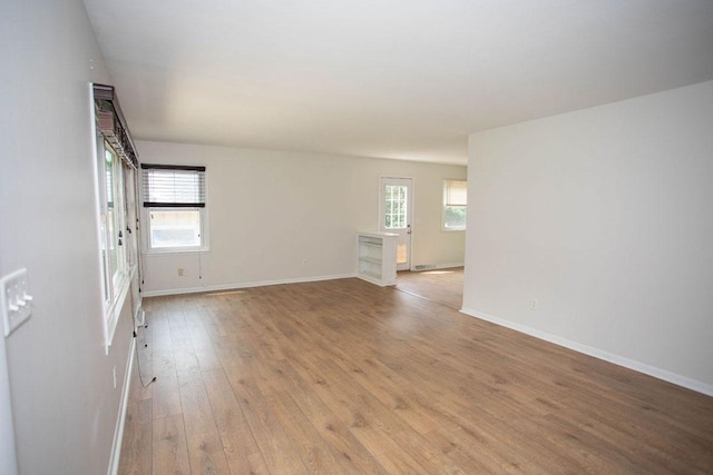 29930 Nathan Ct, Lindstrom, MN 55045 - spare room featuring light wood-style flooring and baseboards