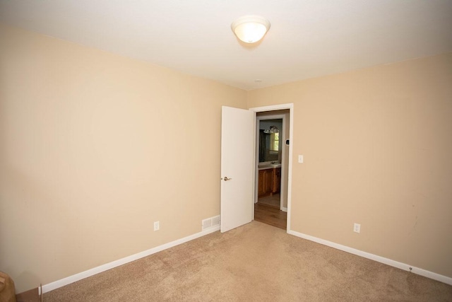 29930 Nathan Ct, Lindstrom, MN 55045 - spare room featuring light colored carpet and baseboards