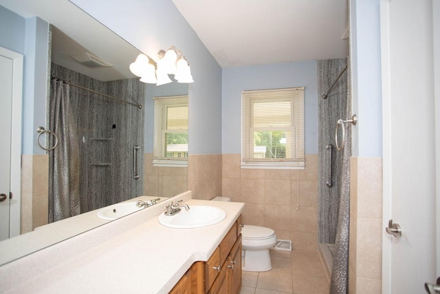 29930 Nathan Ct, Lindstrom, MN 55045 - full bath featuring tile patterned flooring, tile walls, vanity, a tile shower, and wainscoting