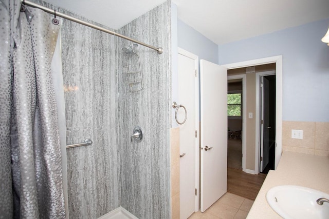 29930 Nathan Ct, Lindstrom, MN 55045 - full bathroom featuring a shower with curtain, tile patterned flooring, and vanity