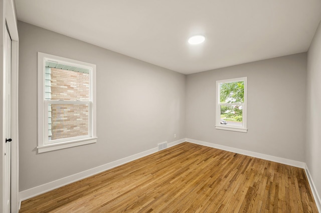 5644 Upton Ave S, Minneapolis, MN 55410 - spare room featuring baseboards and light wood-type flooring