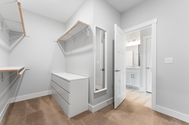 837 Towne Dr NE, Byron, MN 55920 - spacious closet featuring light colored carpet and a sink