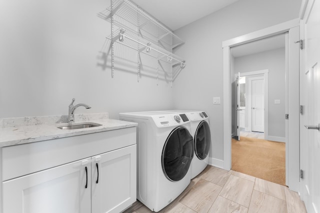 837 Towne Dr NE, Byron, MN 55920 - washroom with washer and dryer, light carpet, and cabinet space