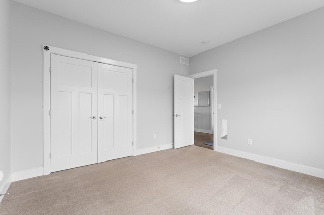 837 Towne Dr NE, Byron, MN 55920 - unfurnished bedroom with carpet and a closet