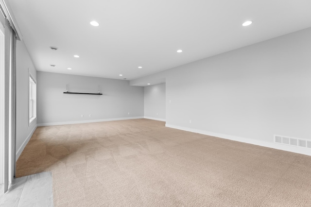 837 Towne Dr NE, Byron, MN 55920 - spare room featuring recessed lighting and light colored carpet