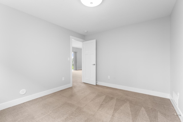 837 Towne Dr NE, Byron, MN 55920 - spare room with carpet and baseboards