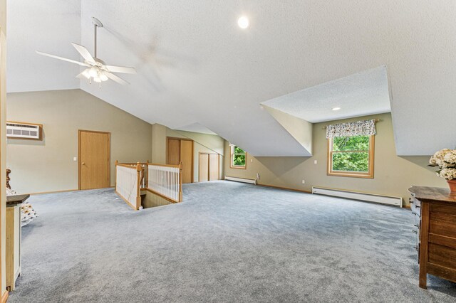 3703 Beard Ave N, Robbinsdale, MN 55422 - additional living space with baseboard heating, vaulted ceiling, ceiling fan, plenty of natural light, and carpet floors
