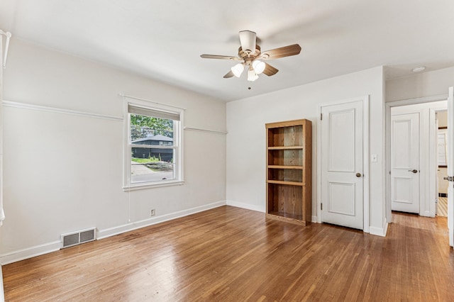 3703 Beard Ave N, Robbinsdale, MN 55422 - empty room featuring ceiling fan and wood finished floors