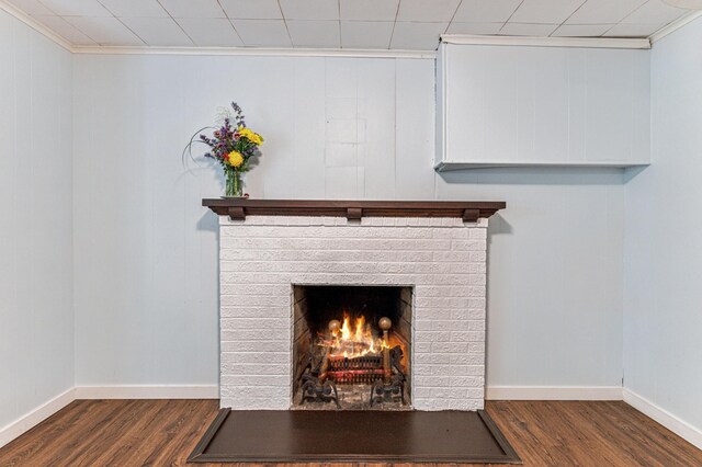 3703 Beard Ave N, Robbinsdale, MN 55422 - detailed view of wood finished floors, a fireplace, and ornamental molding