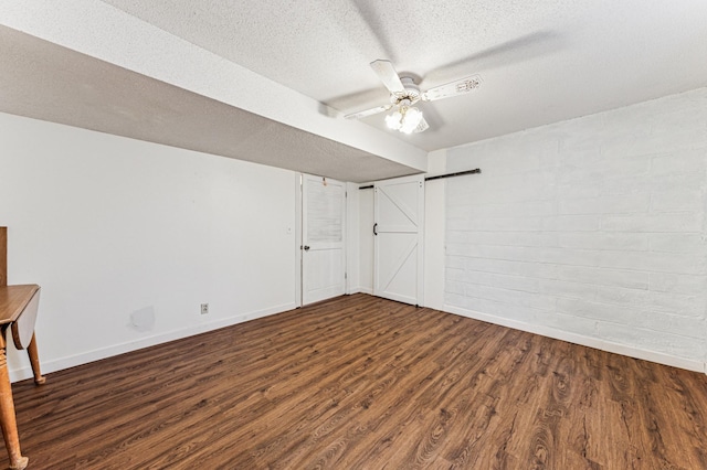 3703 Beard Ave N, Robbinsdale, MN 55422 - unfurnished bedroom featuring wood finished floors, a textured ceiling, and ceiling fan