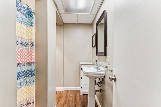 3703 Beard Ave N, Robbinsdale, MN 55422 - full bath featuring wood finished floors and curtained shower