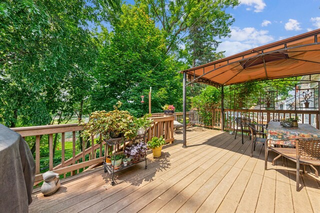 3703 Beard Ave N, Robbinsdale, MN 55422 - wooden deck featuring outdoor dining space and grilling area