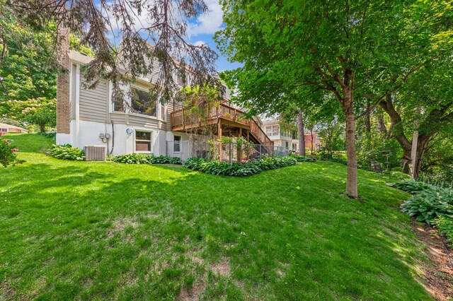 3703 Beard Ave N, Robbinsdale, MN 55422 - back of property with a yard, a deck, and a chimney
